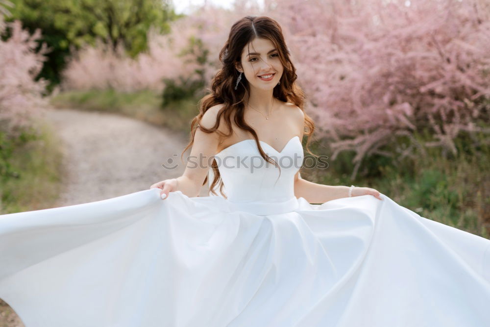 Similar – Image, Stock Photo Woman smiling in the flowered garden in the spring time