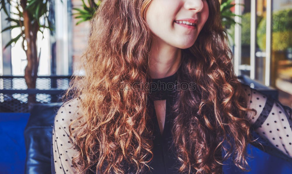 Similar – Young natural woman with freckles and wild curly hair looking at the camera