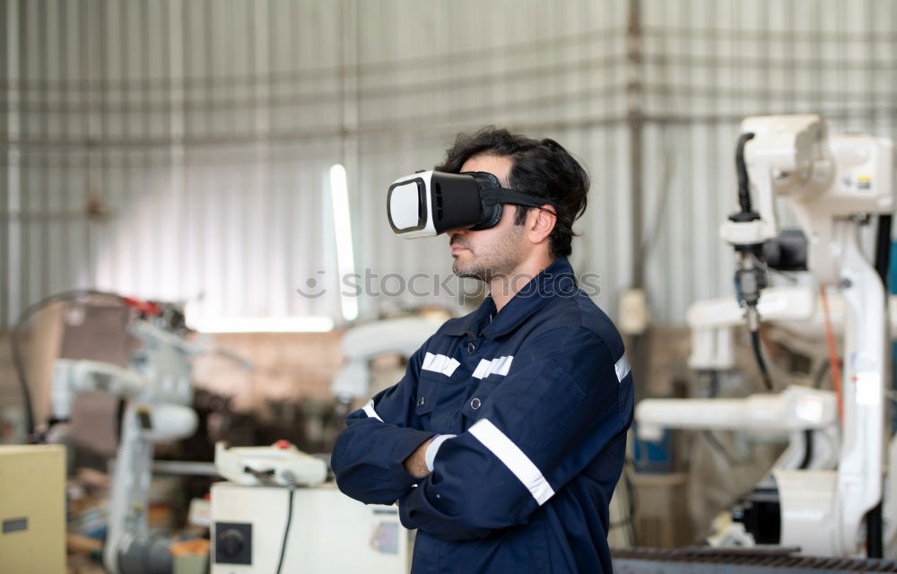 Similar – Image, Stock Photo Mechanic checking motorcycle