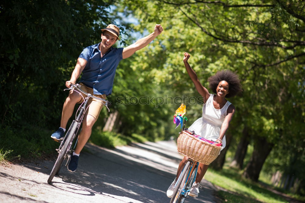 Similar – Image, Stock Photo Women with bikes browsing smartphone