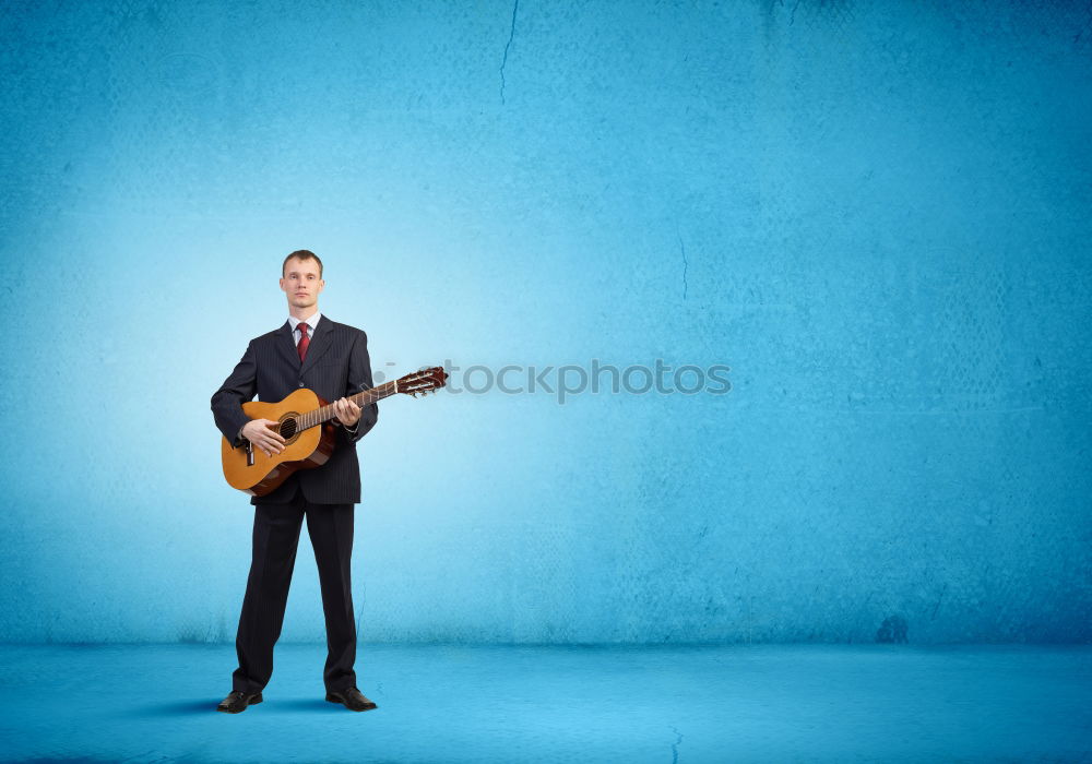 Similar – Image, Stock Photo outdoor photo session with a bass player and his instruments