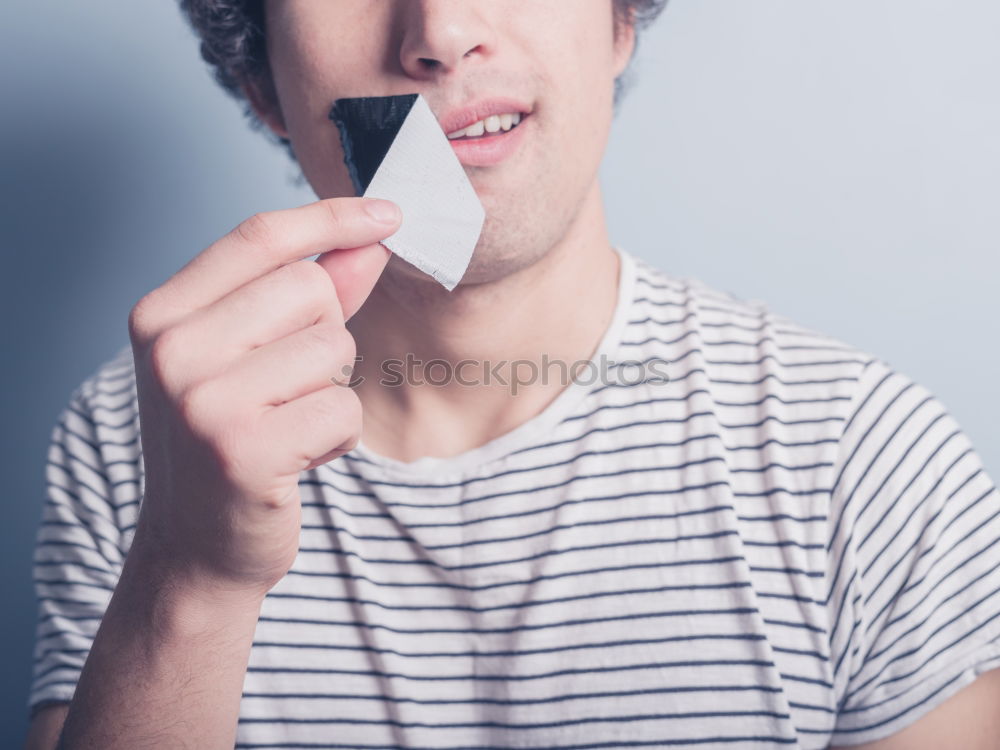 Similar – Image, Stock Photo Young man playing with soap bubbles