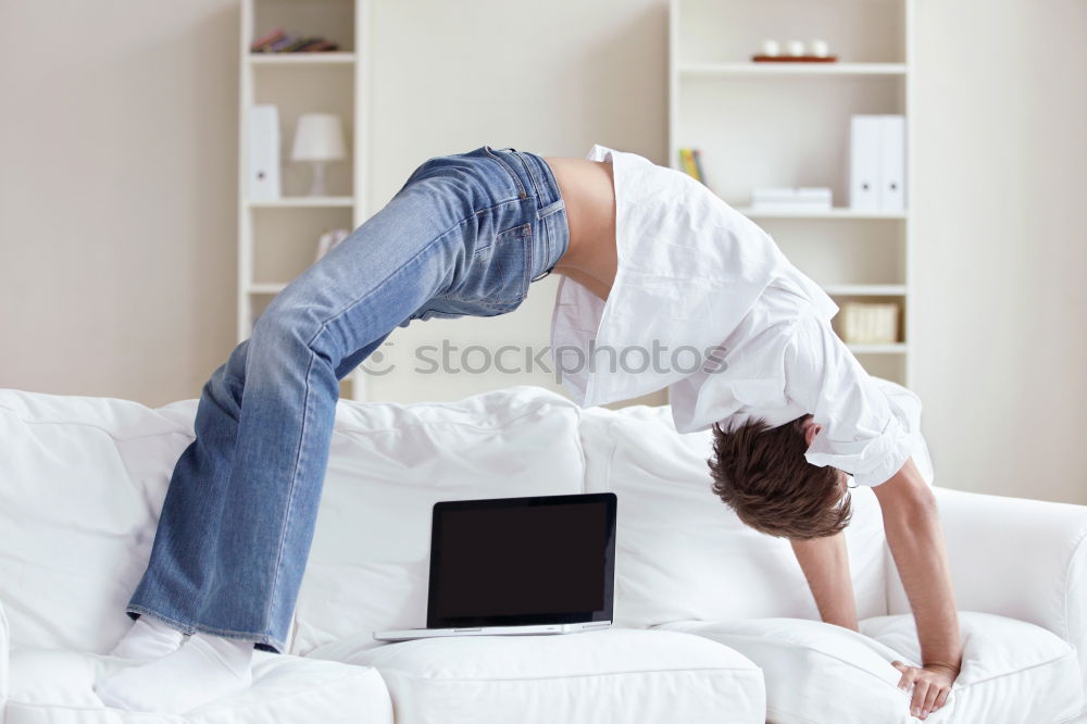 Similar – Image, Stock Photo Young girl looking at mobile phone while sitting on bed