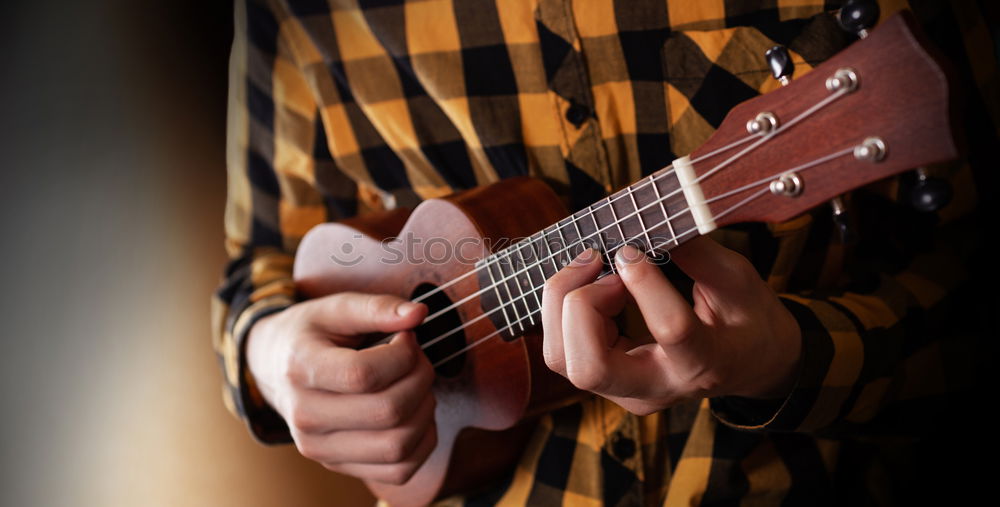 Similar – Hand mit Ukulele im Wald