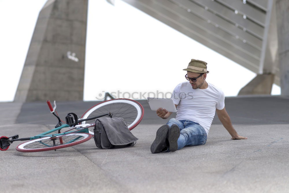 Similar – Image, Stock Photo Smiling man with sunglasses sitting at bicycle