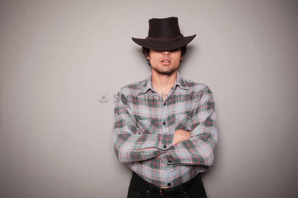 Similar – Image, Stock Photo Bearded man in hat against sunlight