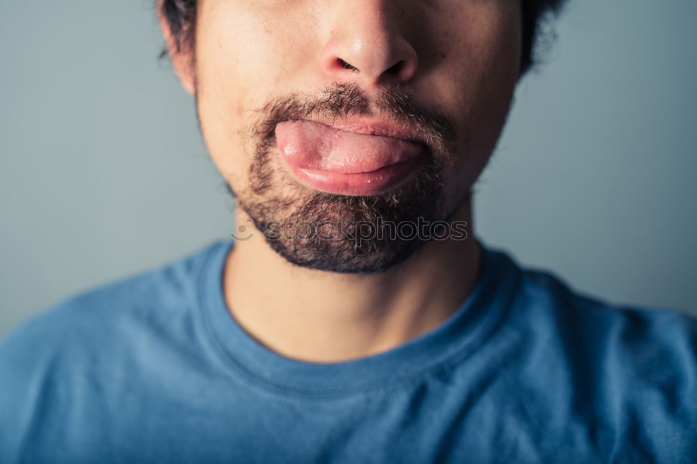 Similar – Stylish man chewing a gum