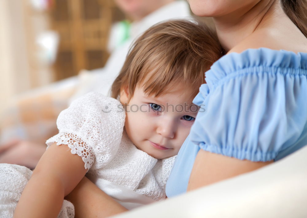 Similar – Image, Stock Photo Close-up of mother breastfeeding her little baby on the patio