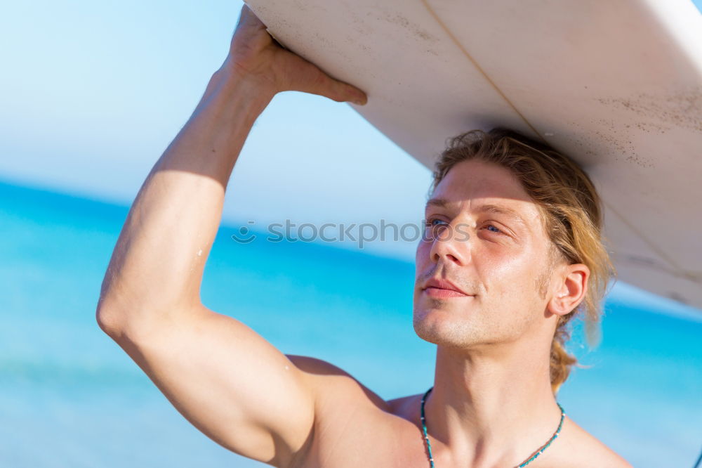 Similar – Athletic man balancing on gymnastic rings