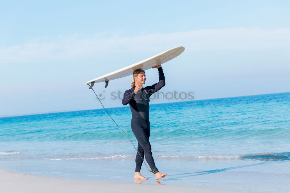 Similar – Image, Stock Photo Man in wetsuit swimming in ocean