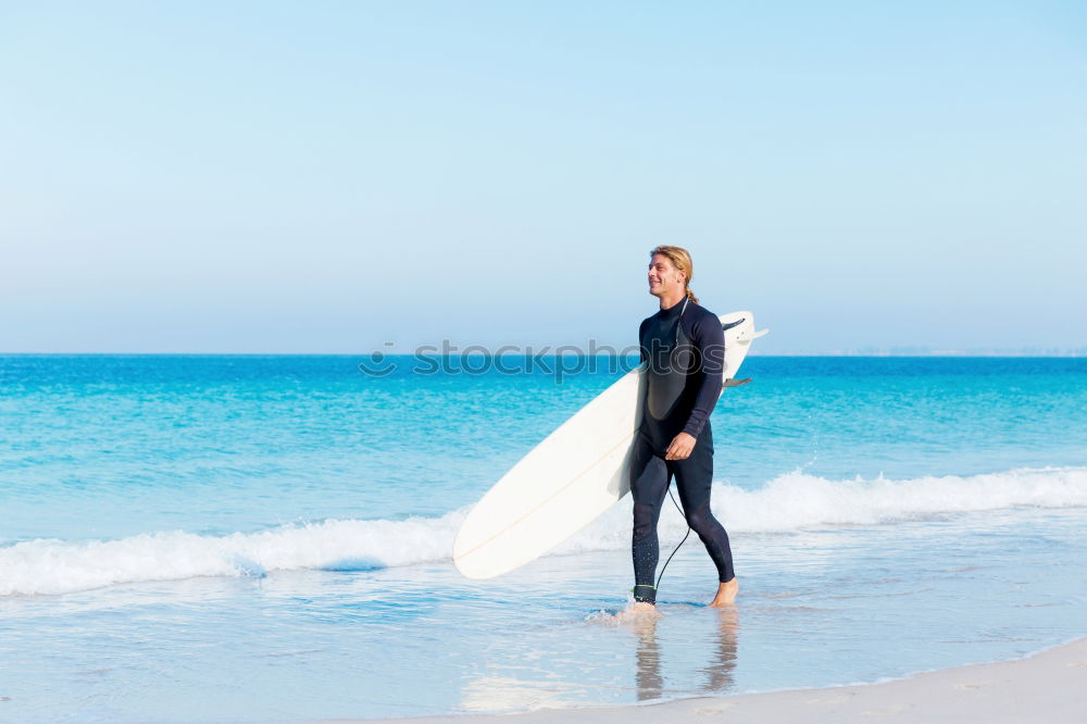 Similar – Image, Stock Photo Man in wetsuit swimming in ocean