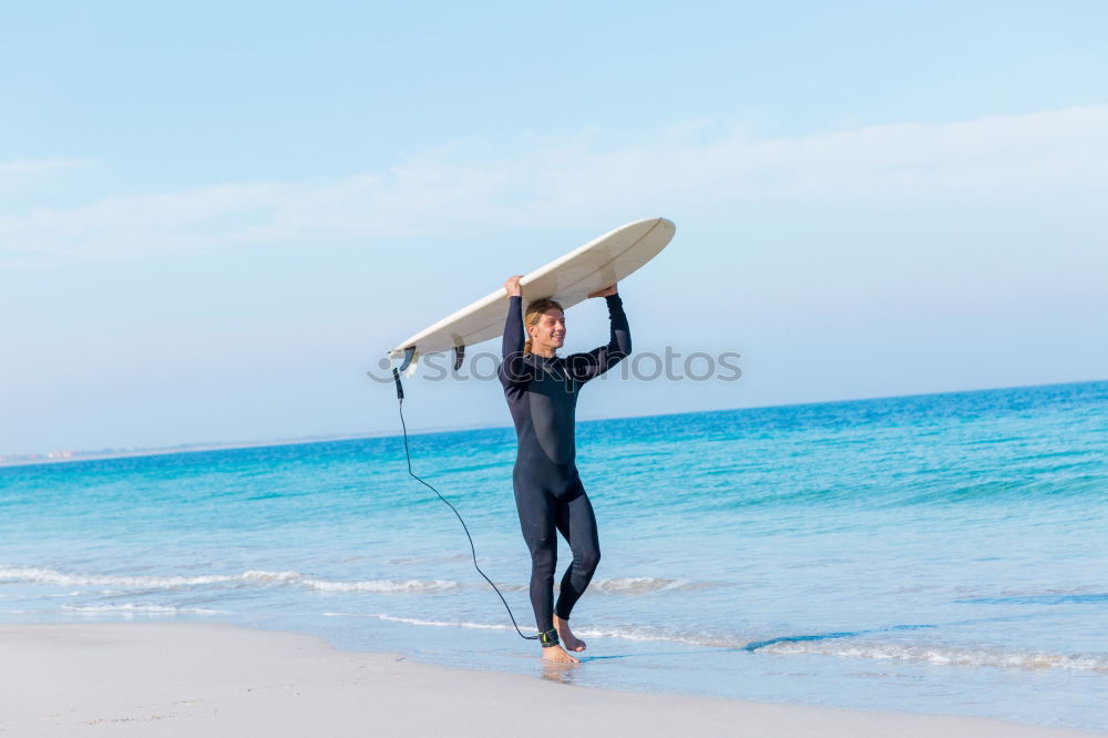 Similar – Image, Stock Photo Man in wetsuit swimming in ocean