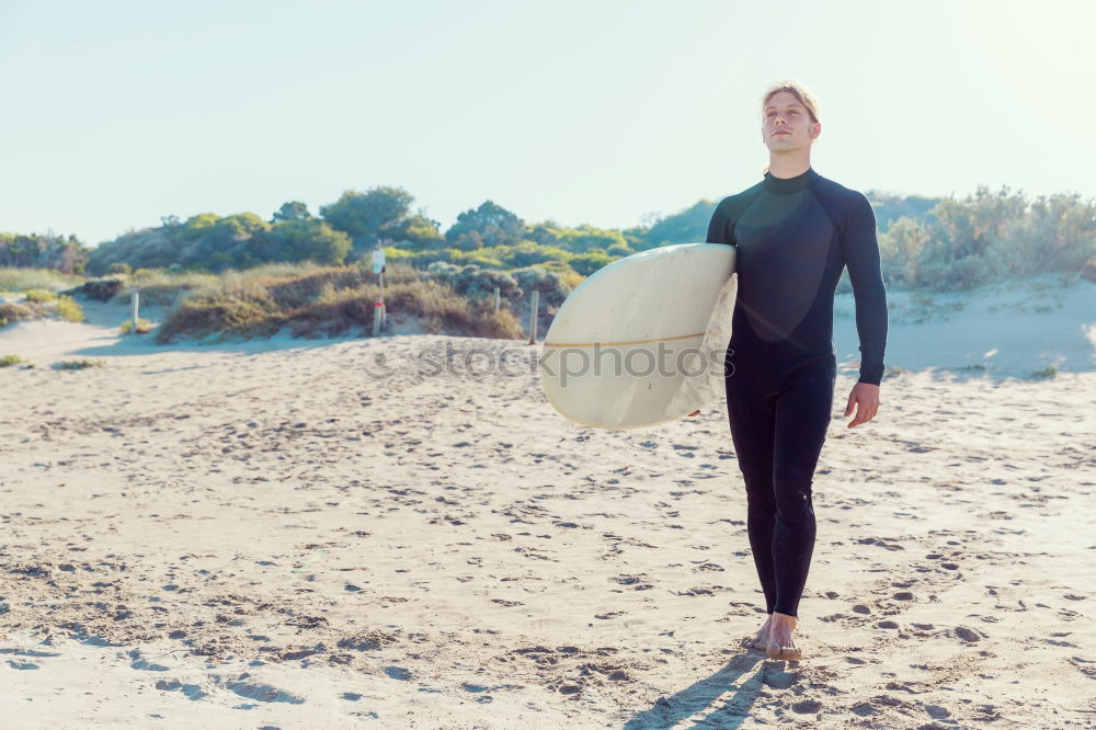 Athletic Handsome Man Running at the River Bridge