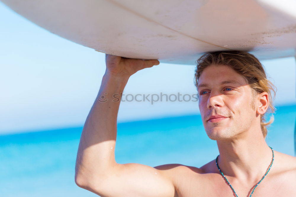 Similar – Athletic man balancing on gymnastic rings