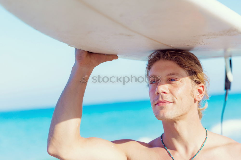 Similar – Athletic man balancing on gymnastic rings