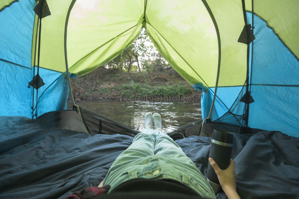 Similar – Tent in storm and rain in an autumn landscape