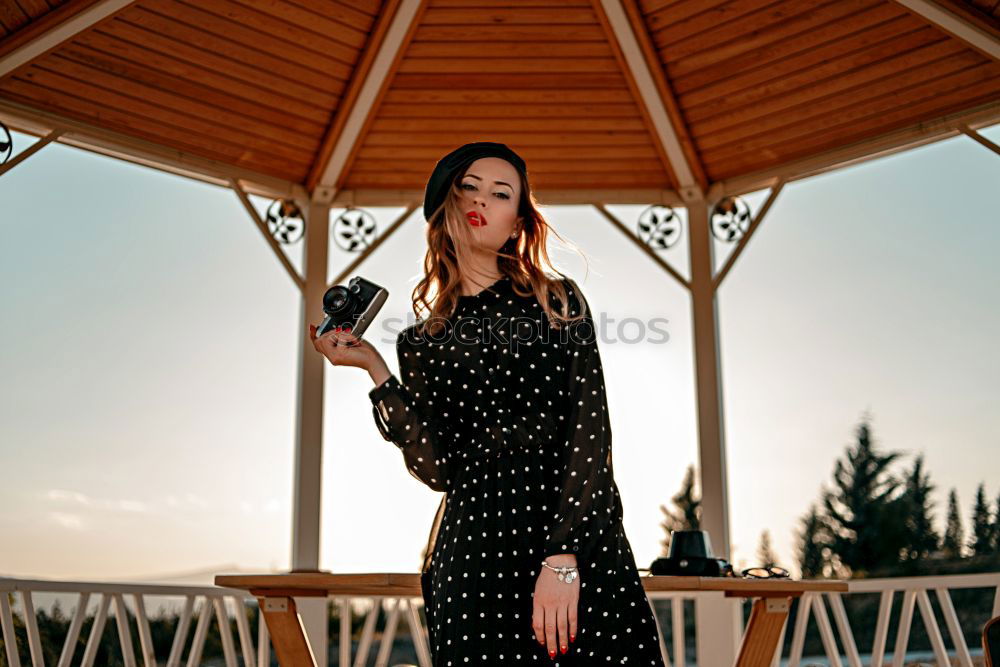 Similar – Young woman posing on stairs on street