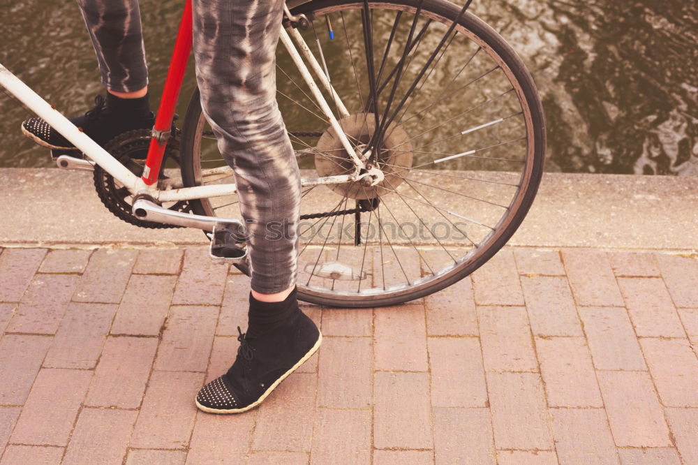 Similar – Handsome afro man relaxing near his bike.