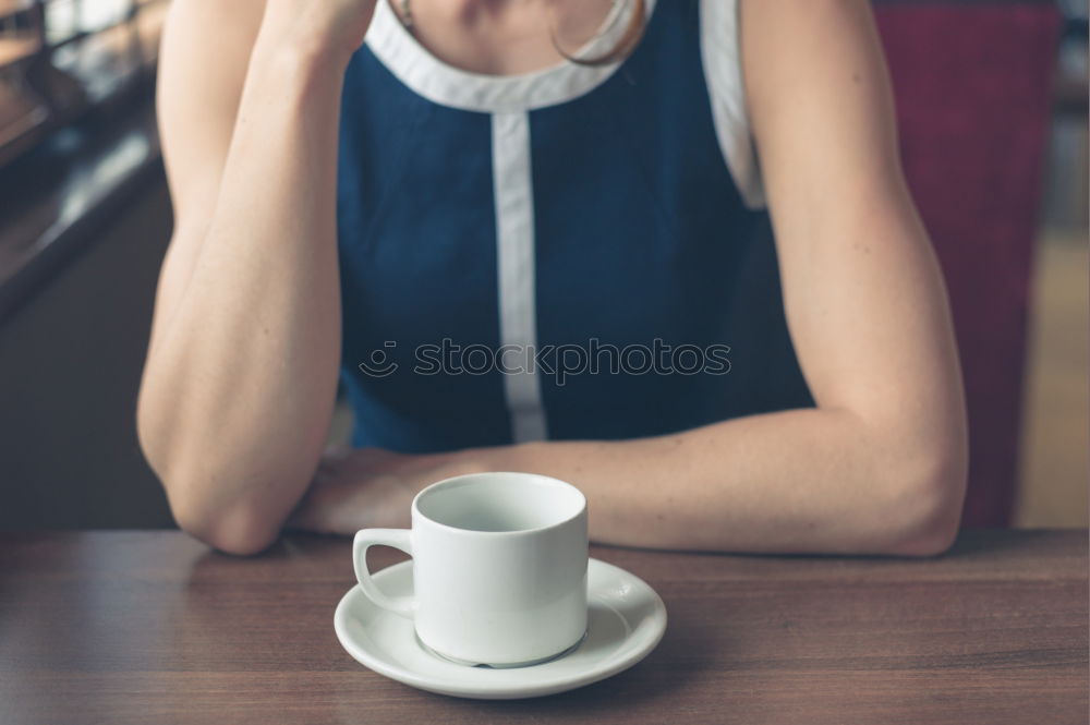 Similar – Ethnic woman stirring cup of coffee