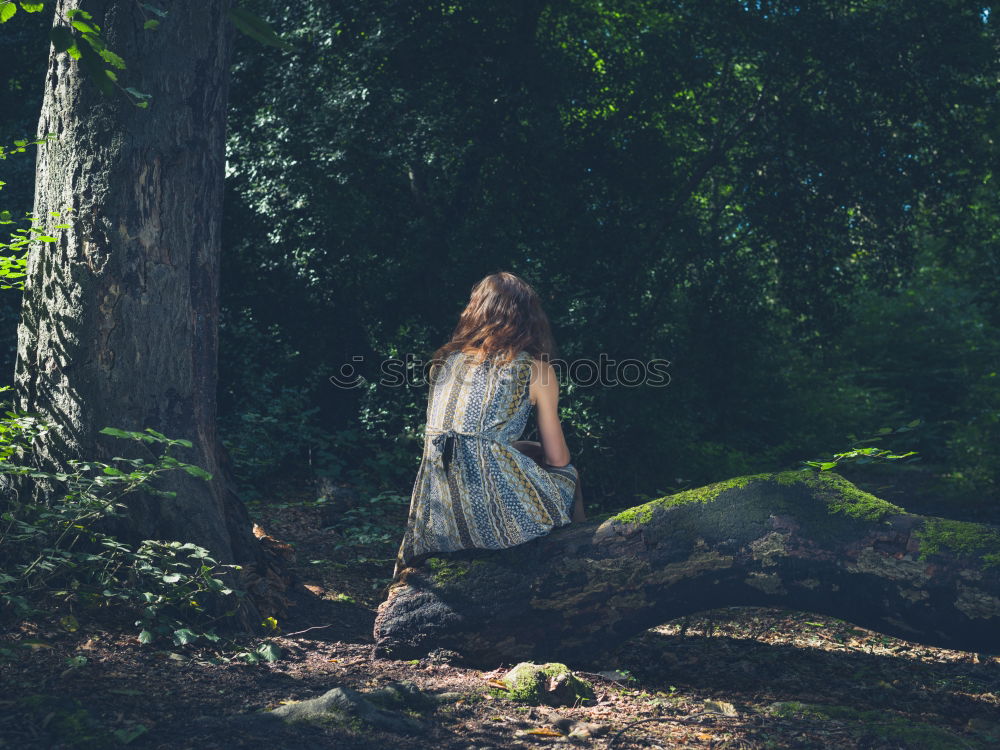 Similar – A Young Woman Standing in the Woods