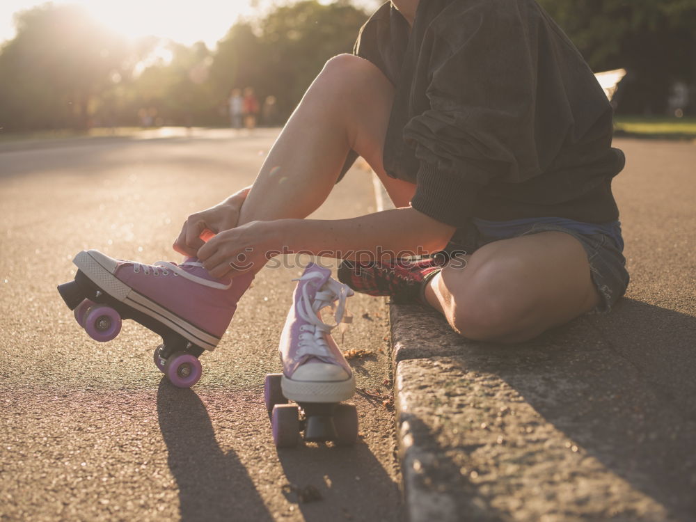 Similar – Man posing with skateboard in evening