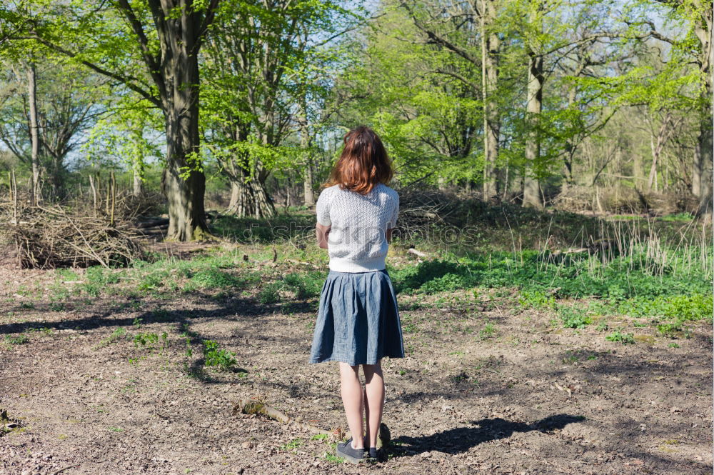 Similar – Young woman in a summer dress standing in an asparagus field