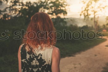 Similar – Woman posing in forest