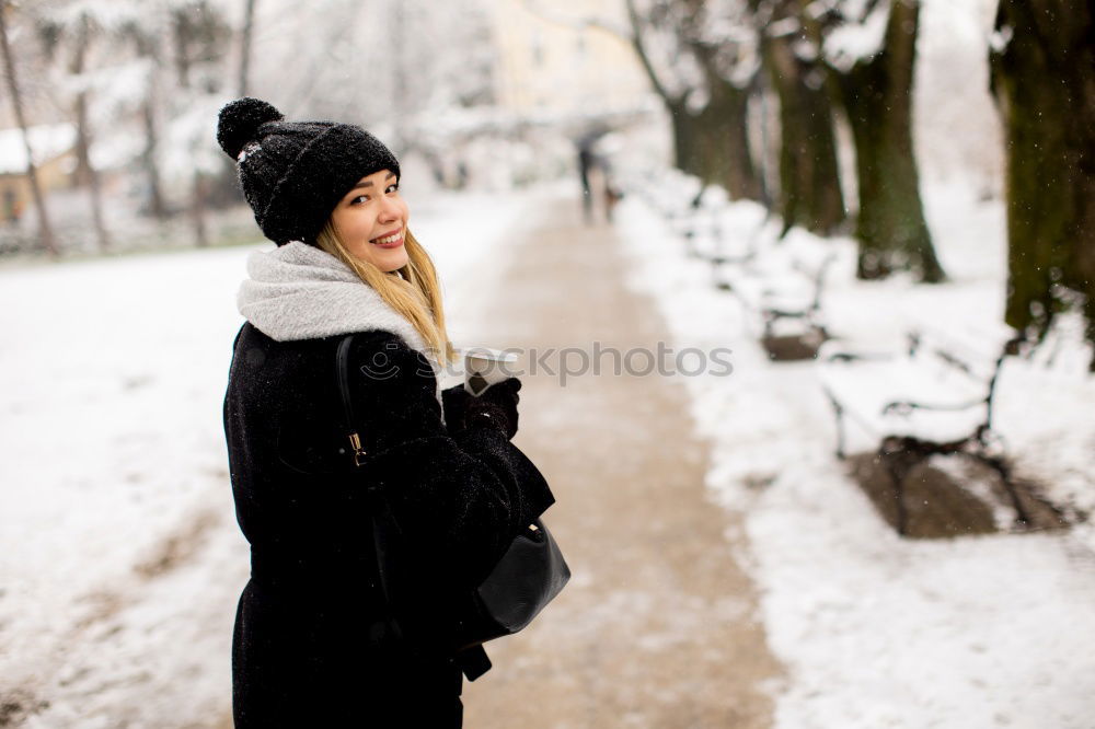 Similar – Image, Stock Photo Attractive woman on snowy street