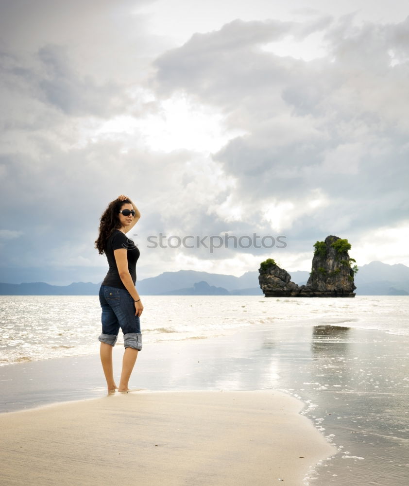 Similar – Image, Stock Photo Diver in wet suit standing on beach