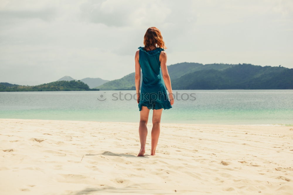 Similar – Image, Stock Photo Woman walking on sand shore near water