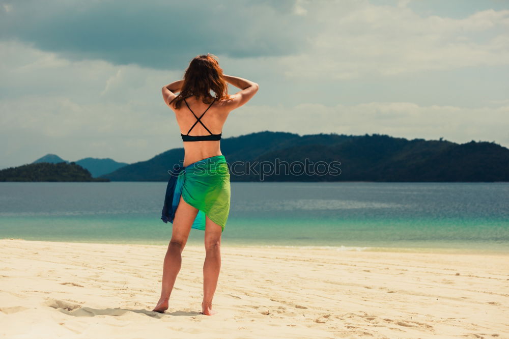 Similar – Image, Stock Photo Woman walking on sand shore near water