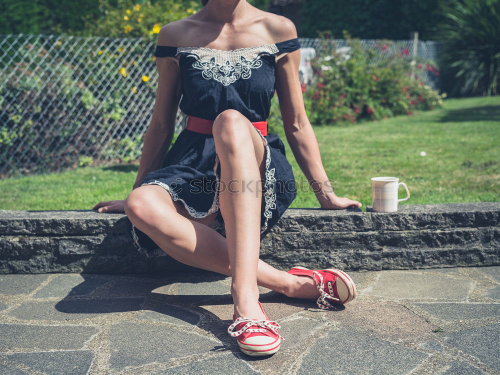 Similar – Image, Stock Photo Sportswoman doing leg stretches