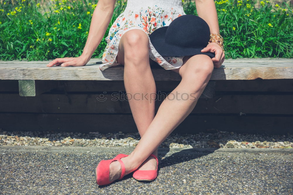 Similar – Cheerful brunette woman lying in grass