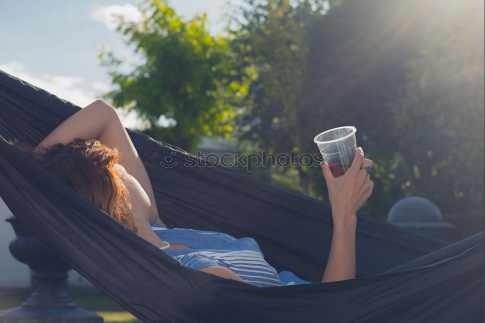 Similar – Young woman with steaming cup