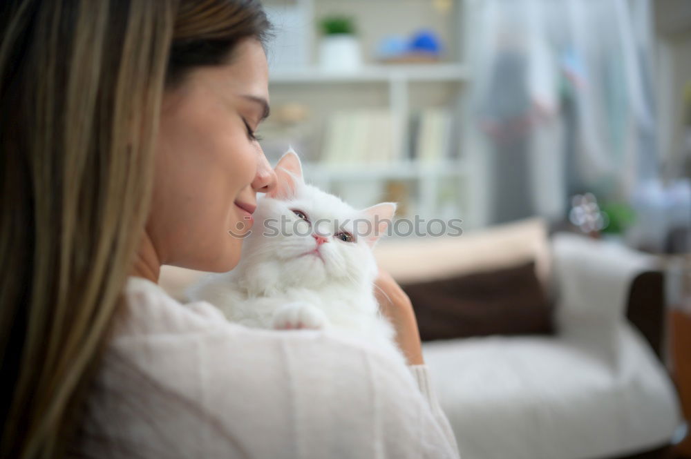 Similar – Image, Stock Photo Smiling woman stroking cat