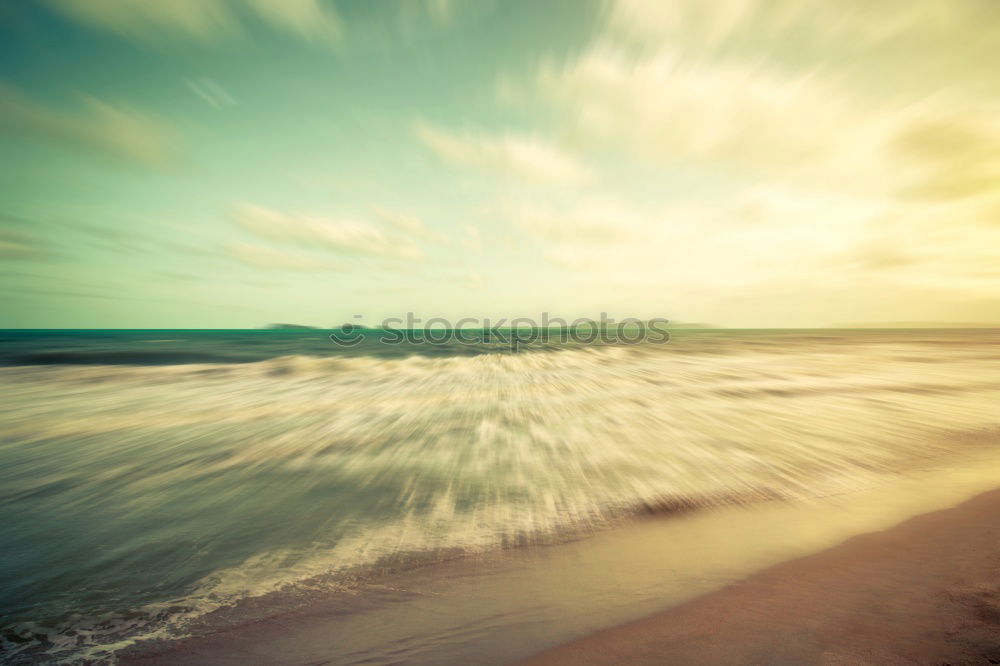 Similar – Image, Stock Photo Endless beach at Rainbow Beach. Walk left at the beach. A car is approaching. In the background a medium high mountain.