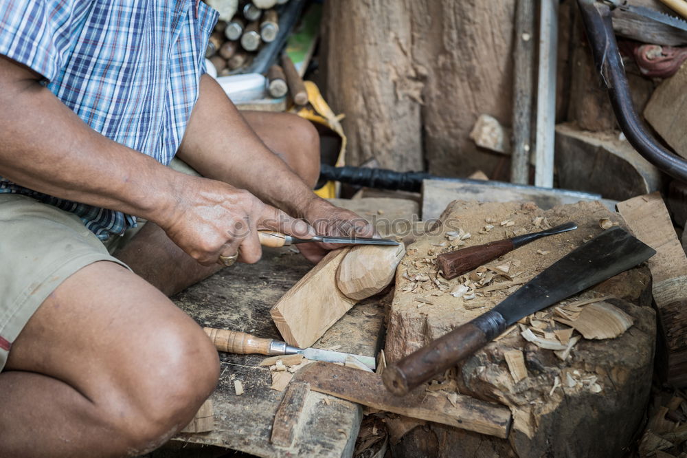 Similar – Image, Stock Photo Professional carpenter sanding and refinishing wood surface.