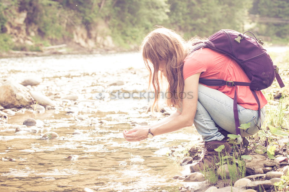 Similar – Image, Stock Photo Young tourist with backpack looks through a binoculars