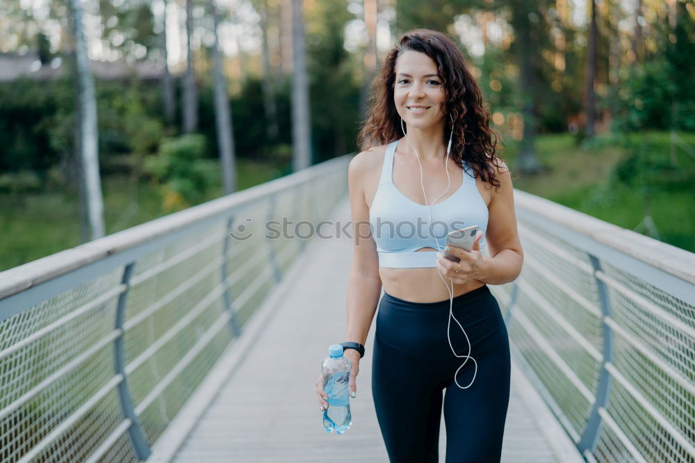 Similar – Image, Stock Photo Fit woman runner checking smartwatch outdoors