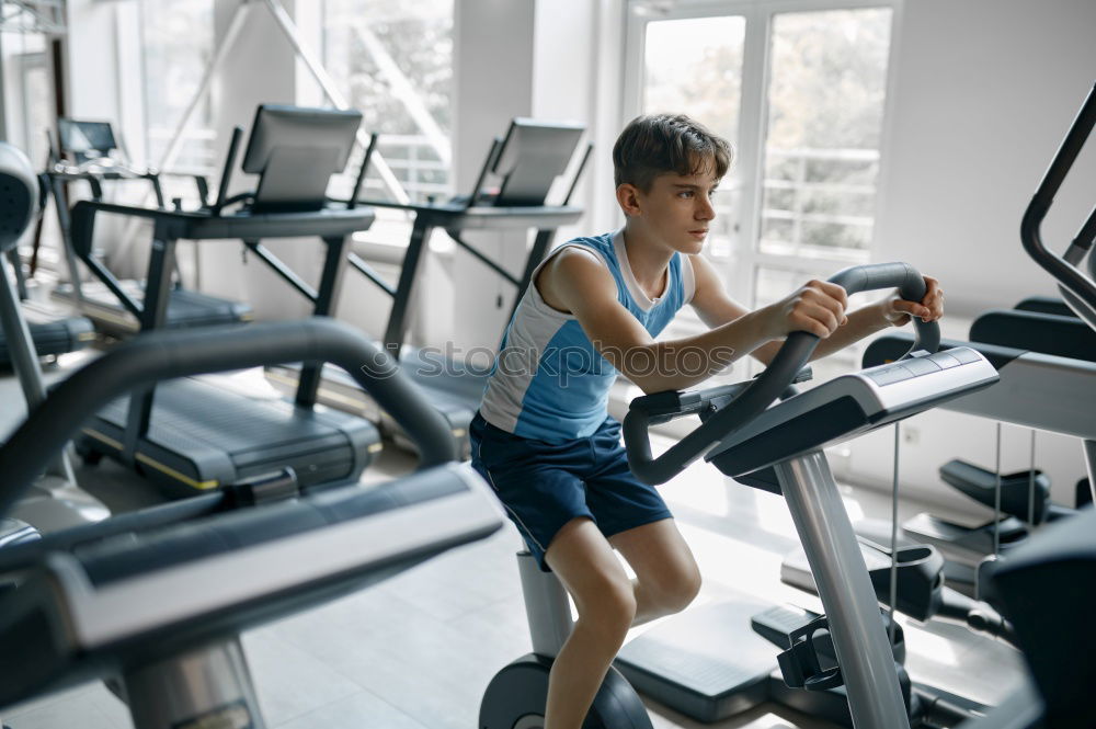 Similar – Image, Stock Photo People running over treadmill in a training session