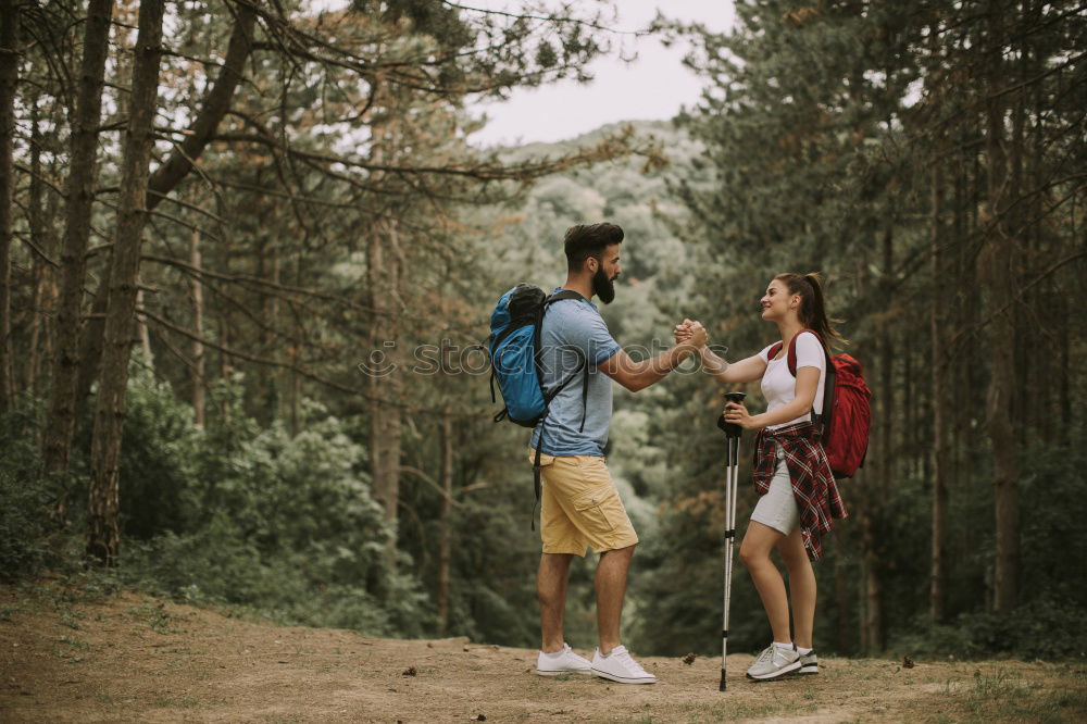 Similar – Image, Stock Photo Coupole holding hands standing on a road