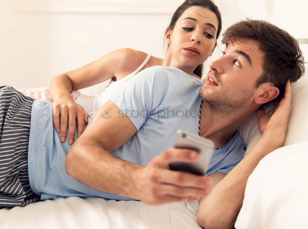 Similar – Image, Stock Photo Couple browsing on online on smartphone at home