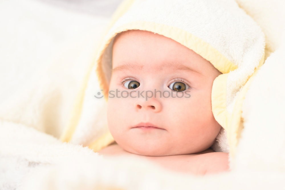 Similar – Image, Stock Photo Lovely newborn baby girl with a warm pajama at home