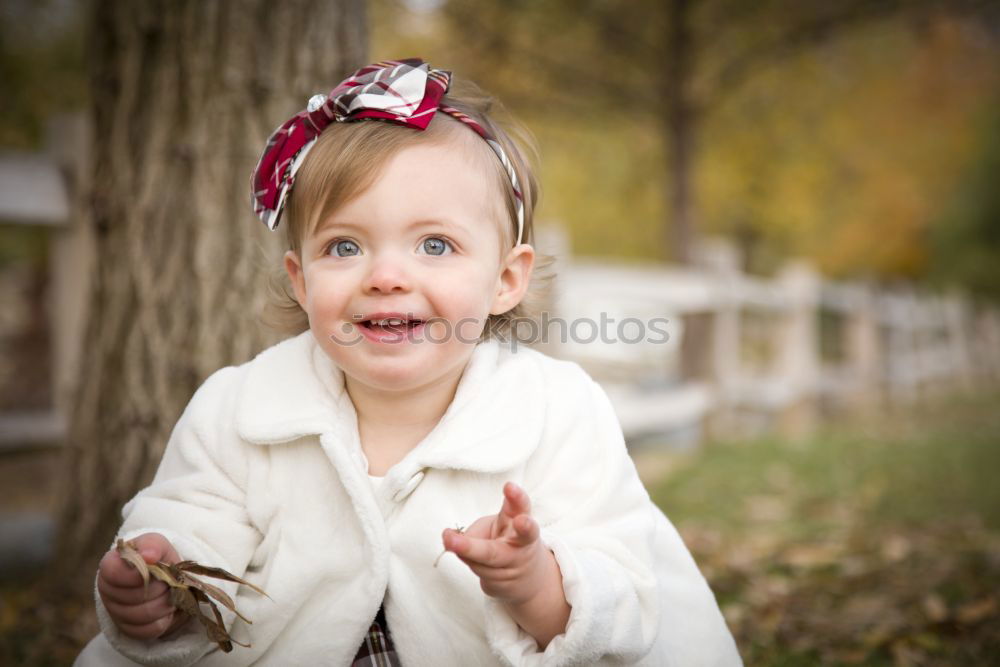 Similar – Image, Stock Photo Smiling girl between meadow with dry leaves