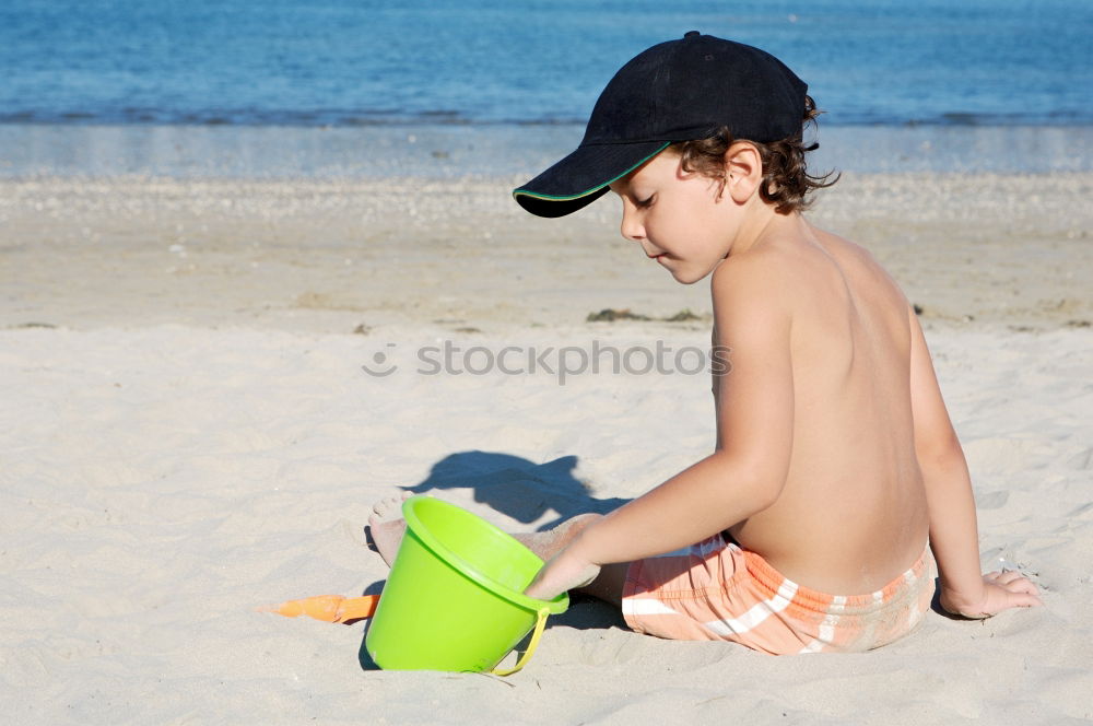 Similar – Two happy children playing on the beach