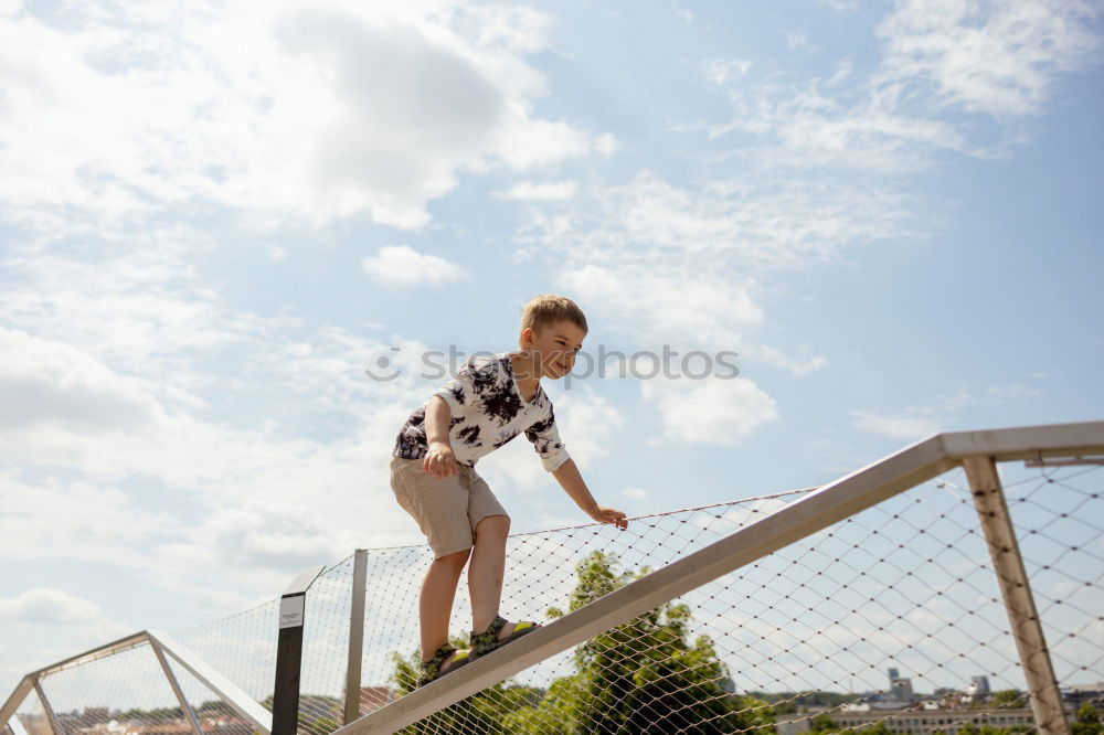 Similar – Image, Stock Photo Woman with earphones lacing shoes on street