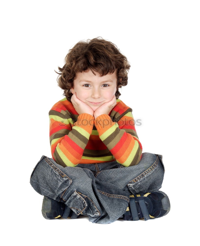 Similar – Happy boy sitting on the floor