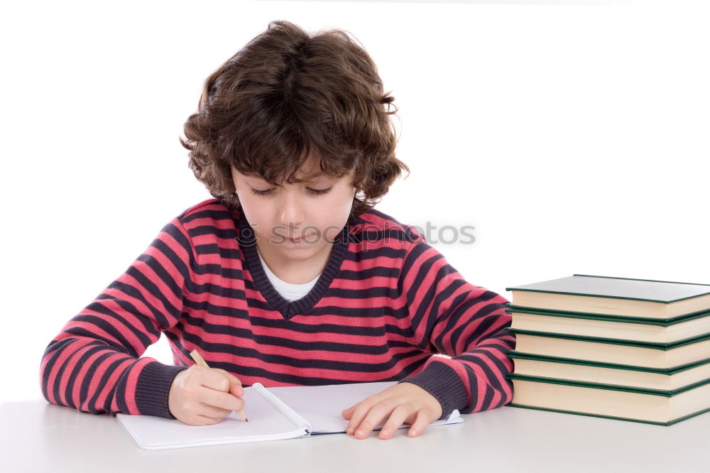 Similar – Concentrated child studying