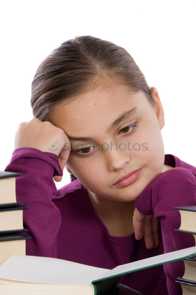 Image, Stock Photo Cute little girl lying on the carpet reading a book