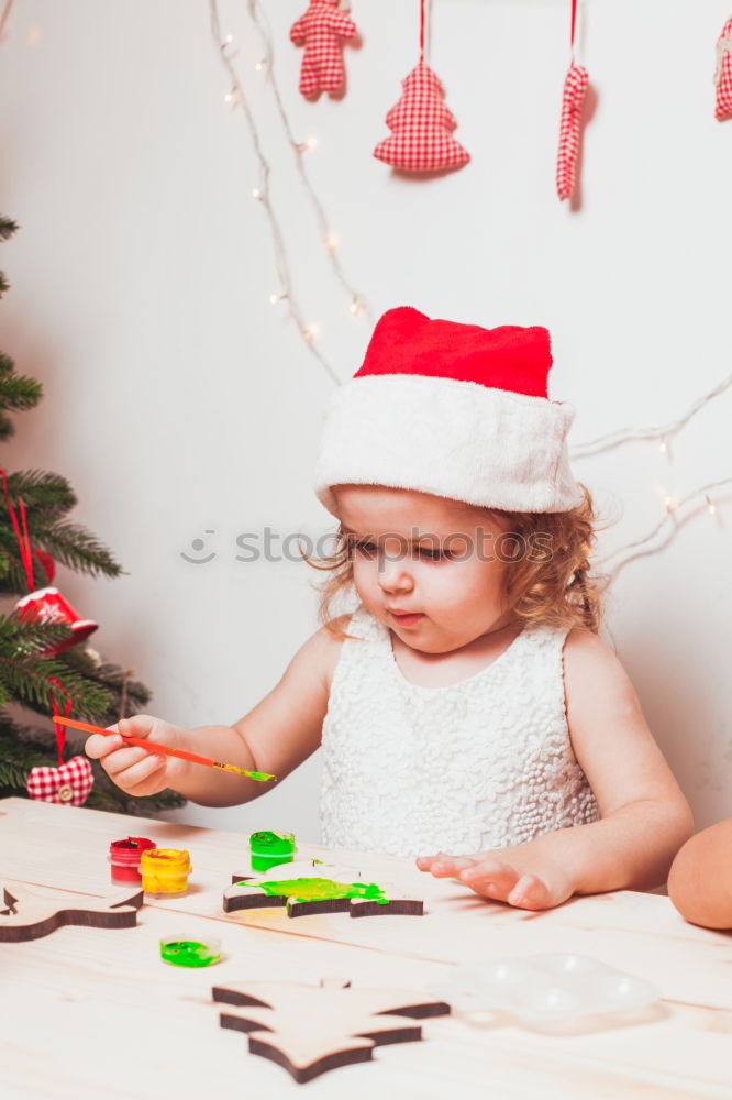 Similar – Mother and son decorating Christmas biscuits at home